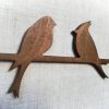 Medinė sienos dekoracija 2 paukščiai, vaškuota